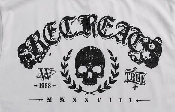Skull Crest Tee — Vintage Gothic Graphic T-Shirt